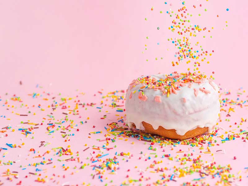 Image of sprinkles on a doughnut